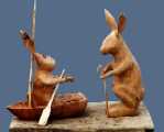 Rabbit in Boat and Rabbit with stick 49 Cms. Beech